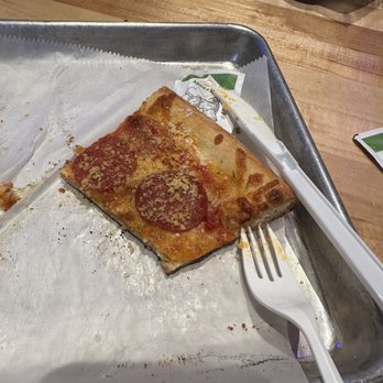 Papa Keno's Pizzeria - a half eaten pizza - Pizza Near Me - Lawrence, Kansas Papa Keno's Pizzeria - a half eaten pizza - Pizza Near Me - Lawrence, Kansas