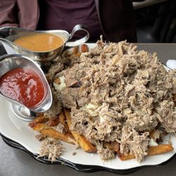 Tide and Boar Gastropub - Boar poutine - meat was dry and cheese curds weren't melted. No taste.... Definitely needed the ketchup and gravy.
