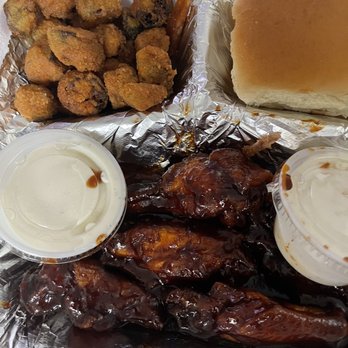 Arkansas Best Wings - a tray of chicken wings, fries, and a burger - Barbeque Near Me - Sherwood, Arkansas Arkansas Best Wings - a tray of chicken wings, fries, and a burger - Barbeque Near Me - Sherwood, Arkansas