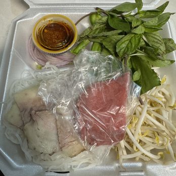 Banh Mi and Pho Express - The Pho "fixings" were packed in a very organized fashion and the rare beef was in a baggie. - Vietnamese Near Me - Jacksonville, Florida Banh Mi and Pho Express - The Pho "fixings" were packed in a very organized fashion and the rare beef was in a baggie. - Vietnamese Near Me - Jacksonville, Florida