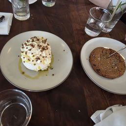 A giant Cookie   and a Strawberry dessert