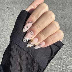 Delano Nail Bar & Spa - Medium almond, cloudy base, chrome design