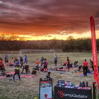 Camp Gladiator - Why would you want to workout indoors when you could workout in the great outdoors?! Sunsets are amazing and the workouts are HARD and fun! - Boot Camps Near Me Camp Gladiator - Why would you want to workout indoors when you could workout in the great outdoors?! Sunsets are amazing and the workouts are HARD and fun! - Boot Camps Near Me
