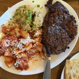 Ribeye, rigatoni with sausage and bacon fried rice Ribeye, rigatoni with sausage and bacon fried rice