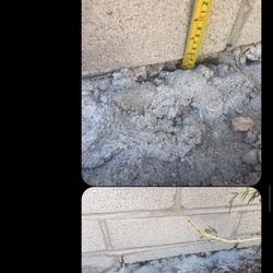 Construction With Quality By Williams & Sons  - Massive amounts of holes and mortar where the footer should have been. Seems like their first time?