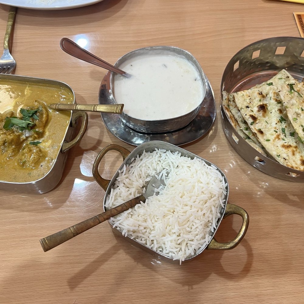 Chettinad curry chicken, garlic mushroom soup, and garlic naan Chettinad curry chicken, garlic mushroom soup, and garlic naan