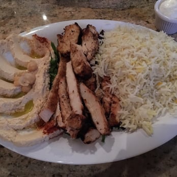 Phoenician Resto Cafe - This is the Grilled Breast Chicken with Hummus and rice as my sides. - Lebanese Near Me - Austin, Texas Phoenician Resto Cafe - This is the Grilled Breast Chicken with Hummus and rice as my sides. - Lebanese Near Me - Austin, Texas