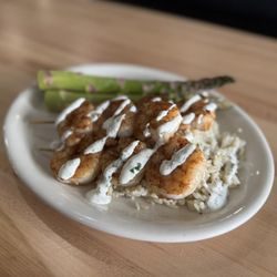 Grandy's Bar and Grill - Baja shrimp with a cilantro lime rice and a cilantro lime creama with choice of side.