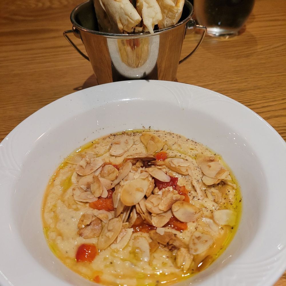 Griendel - Hummus with grilled pita bread. Very good. - Brasseries Near Me - Quebec City, Quebec Griendel - Hummus with grilled pita bread. Very good. - Brasseries Near Me - Quebec City, Quebec