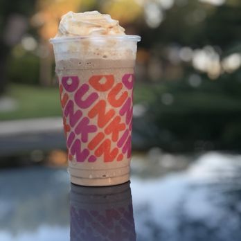 Dunkin' - a cup of iced coffee on a table - Coffee & Tea Near Me - Fort Lauderdale, Florida Dunkin' - a cup of iced coffee on a table - Coffee & Tea Near Me - Fort Lauderdale, Florida