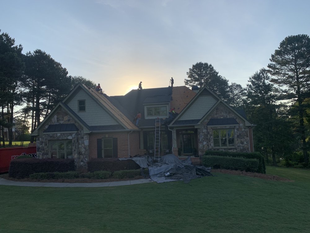 Slide of ProsTouch Roofing