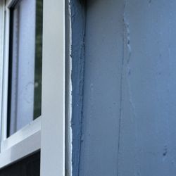 Comfort Windows & Doors - Gap between wood trim and wrap, not sealed or secured properly!!