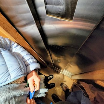 Hôtel du Pas de Calais - Tight squeeze in elevator - Hotels Near Me - Paris, 75 Hôtel du Pas de Calais - Tight squeeze in elevator - Hotels Near Me - Paris, 75