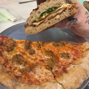 Prometheus Pizza - Chicken Parmesan sandwich, sausage and hot honey pizza, both fantastic - Pizza Near Me - Fredericksburg, Texas