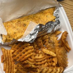 The Morning Jump Coffee Company - Chicken ceaser wrap with waffle fries! (The fries are so good. If you like seasoned fries this is your fry!)