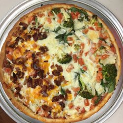 Sarpino's Pizzeria - Spinach and broccoli meets bacon cheese burger pizza.