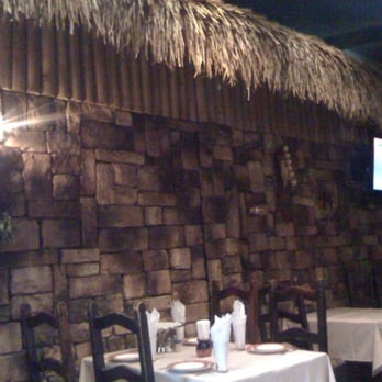Hatsatoun - exotic decor:  rock walls, slate floors, Hawaii huut molding, blue ceilings and a disco ball! - Mediterranean Near Me - Glendale, California