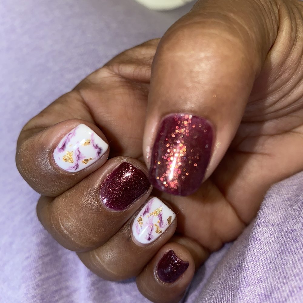 Smiley Nails - Hand painted lines of maroon on white nails. Gel ruby nails with white with dark red marbled swirls and gold flecks. - Nail Salons Near Me - Honolulu, Hawaii Smiley Nails - Hand painted lines of maroon on white nails. Gel ruby nails with white with dark red marbled swirls and gold flecks. - Nail Salons Near Me - Honolulu, Hawaii