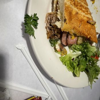 Moon Hut Restaurant - a sandwich and salad on a plate - New American Near Me - Cape Canaveral, Florida Moon Hut Restaurant - a sandwich and salad on a plate - New American Near Me - Cape Canaveral, Florida