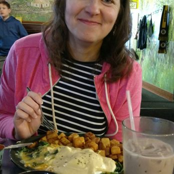 Keltic Kitchen - Poached eggs over spinach with holindais sauce and home fries. - Breakfast & Brunch Near Me - West Yarmouth, Massachusetts Keltic Kitchen - Poached eggs over spinach with holindais sauce and home fries. - Breakfast & Brunch Near Me - West Yarmouth, Massachusetts