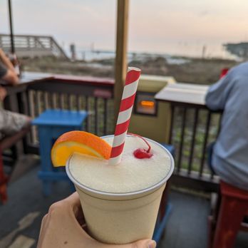 Hook’d Pier Bar & Grill - Pina colada with a view - New American Near Me - Panama City Beach, Florida