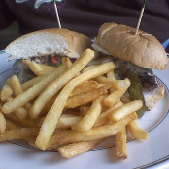 The Promenade Cafe - My friend's filly cheese steak sandwich. That was tasty too...I know I swiped a piece...but only yelpers know this. - Cafes Near Me - Long Beach, California The Promenade Cafe - My friend's filly cheese steak sandwich. That was tasty too...I know I swiped a piece...but only yelpers know this. - Cafes Near Me - Long Beach, California
