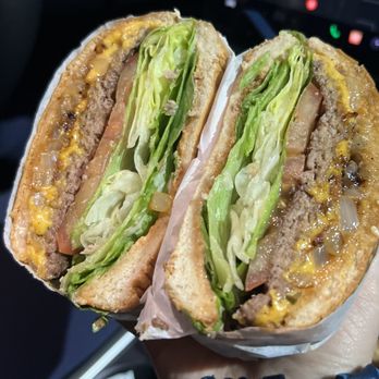 Apollo Burgers - Bacon Cheeseburger with grilled onion with everything - cut in half. - Burgers Near Me - Garden Grove, California Apollo Burgers - Bacon Cheeseburger with grilled onion with everything - cut in half. - Burgers Near Me - Garden Grove, California