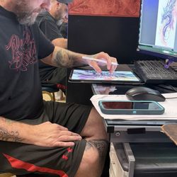 Redline Studio Custom Tattoo - Jack designing a custom piece