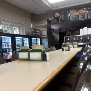 Messhall Cafe - a counter with a variety of items on it - Breakfast & Brunch Near Me - Austin, Texas
