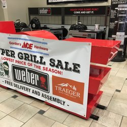 JC Licht Ace Hardware River North - Extensive display of Grills before going down to to the basement entryway to the store.