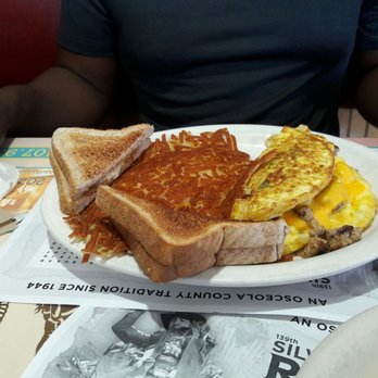 Rodeo Diner - Rodeo Diner 5-29-17 #kimwashere2 Rodeo Special, hot cakes, grits, bacon & eggs $6.59 - Breakfast & Brunch Near Me - Kissimmee, Florida