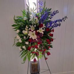 Flower arrangement by E and E House of Flowers for funeral.