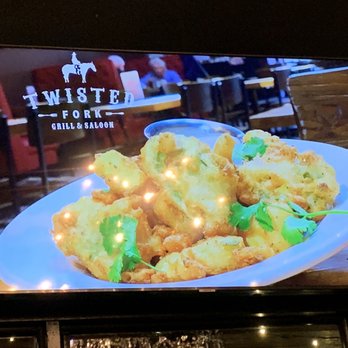 Twisted Fork Grill and Bar - TV monitor rolling the menu - American Near Me - Omaha, Nebraska