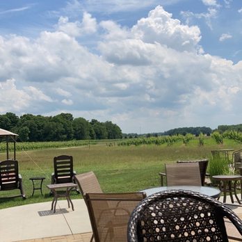 Cogdal Vineyards - tables and chairs outside - Wineries Near Me - South Haven, Michigan