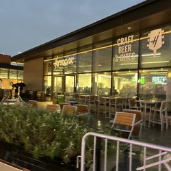 Harmonic Brewing Thrive City - Patio on a rainy night at Chase