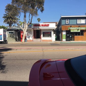 Beach Market - a red car parked on the side of the road - Grocery Near Me - San Diego, California Beach Market - a red car parked on the side of the road - Grocery Near Me - San Diego, California