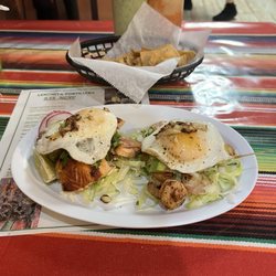 Tortilleria Taqueria Lenchita - Vegetable salmon and shrimp tacos topped with eggs