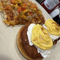 Crooked Hen - Eggs Benedict with crab cakes and loaded hash browns