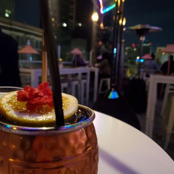 Darling Aviary - Peach and orange blossom "Flockin' Mule" - Bars Near Me - Sacramento, California