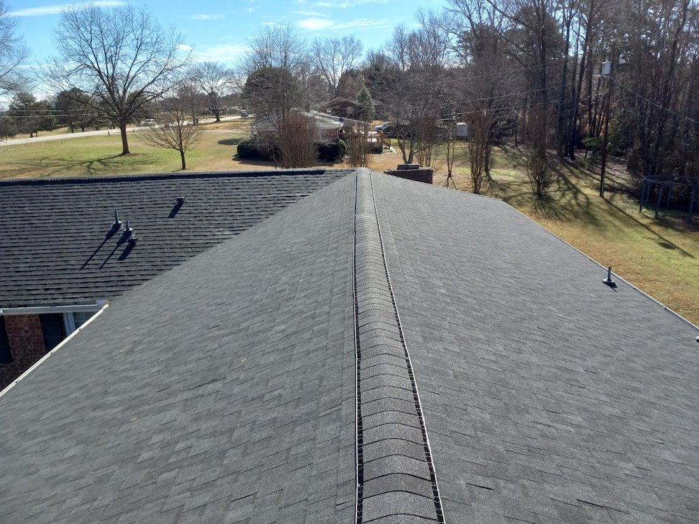 Slide of Wayne's Roofing