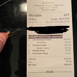 Receipt and staple found in food