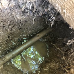 The nickel to quarter size puncture to the pipe