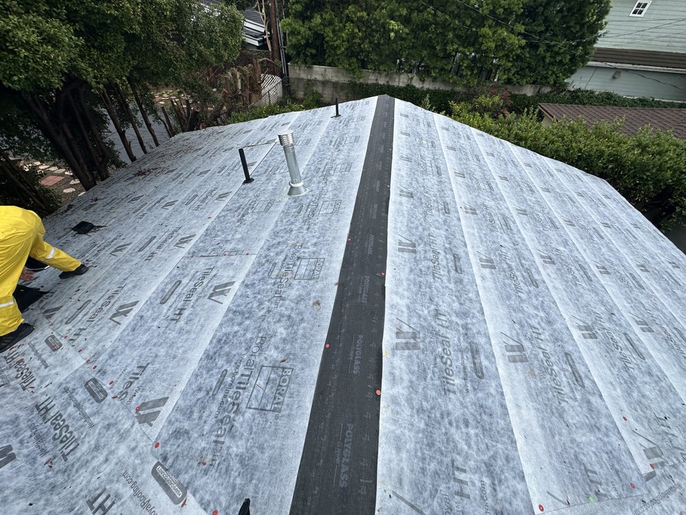 Slide of 3G Tres Generaciones Roofing