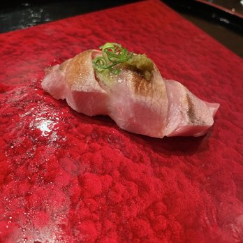 Sunset Sushi - O-toro seared with a 1000 degree piece of Japanese charcoal. - Sushi Bars Near Me - Boca Raton, Florida Sunset Sushi - O-toro seared with a 1000 degree piece of Japanese charcoal. - Sushi Bars Near Me - Boca Raton, Florida