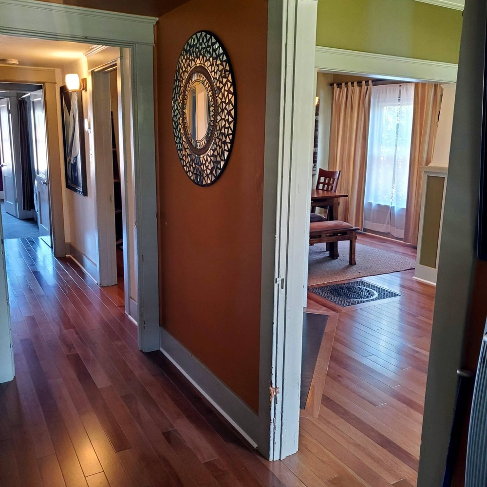 Royal Wood Flooring - a view of a living room and dining room - Flooring Near Me - Phoenix, Arizona Royal Wood Flooring - a view of a living room and dining room - Flooring Near Me - Phoenix, Arizona