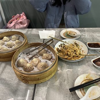 Supreme Dumplings - Supreme Tan Tan Noodles (on the right) - Shanghainese Near Me - Bellevue, Washington Supreme Dumplings - Supreme Tan Tan Noodles (on the right) - Shanghainese Near Me - Bellevue, Washington