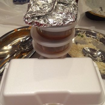 Curry Leaf - Clearly I hated my meal - notice all spoons have been appropriately "licked"!!  Great "to-go" containers too! - Indian Near Me - Albuquerque, New Mexico