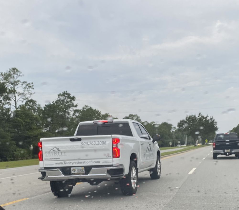 Slide of Trinity Restoration & Roofing