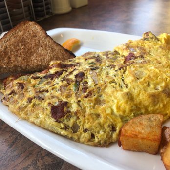 Scrumptious - Meat lovers omelette. - Breakfast & Brunch Near Me - Richmond Hill, Ontario Scrumptious - Meat lovers omelette. - Breakfast & Brunch Near Me - Richmond Hill, Ontario
