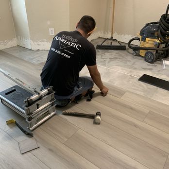 Adriatic Flooring - Denis installing new floor. - Flooring Near Me